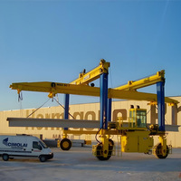 Grue à portique mobile robuste pour les opérations de conteneurs avec une capacité de levage de 20 à 40 tonnes, entraînement par moteur et moteur