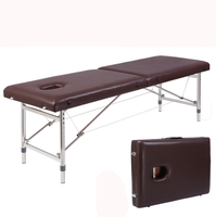Table de massage pliable et portable en métal réglable à prix compétitif pour salon commercial, hôtel et ventouses