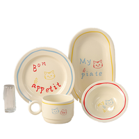 Service de table écologique en porcelaine fine, style coréen, peint à la main, motif chat mignon jaune clair, lignes contrastées rétro, pour fête, comprenant tasses et assiettes