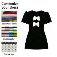 Robe mini noire pour femme avec nœuds blancs, manches courtes bouffantes, découpes, style moulant, robe de soirée élégante, tenue de club pour sorties nocturnes