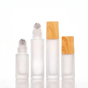Vendita calda 5ml <span class=keywords><strong>10</strong></span> <span class=keywords><strong>ml</strong></span> rotolo di bottiglia di profumo smerigliato su bottiglia di vetro con tappo in legno coperchio a sfera in metallo per olio - Product Image 5