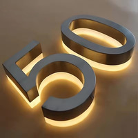 Logotipo personalizado Mini retroiluminado titanio oro resina letras Acero inoxidable LED puerta cabeza publicidad signo iluminado cartelera