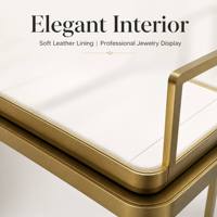 Table de présentation de bijoux en acier inoxydable doré de luxe sur mesure, vitrine à bijoux en verre trempé pour boutique
