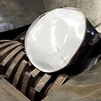 Broyeur de pneus industriels pour ligne de recyclage des pneus usagés, système industriel pour la production de blocs de caoutchouc à partir de pneus usagés