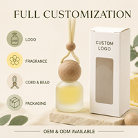 Diffuseur de parfum pour voiture rechargeable à suspendre, flacon en verre givré, bouchon en bois sphérique, 60% de parfum, longue durée
