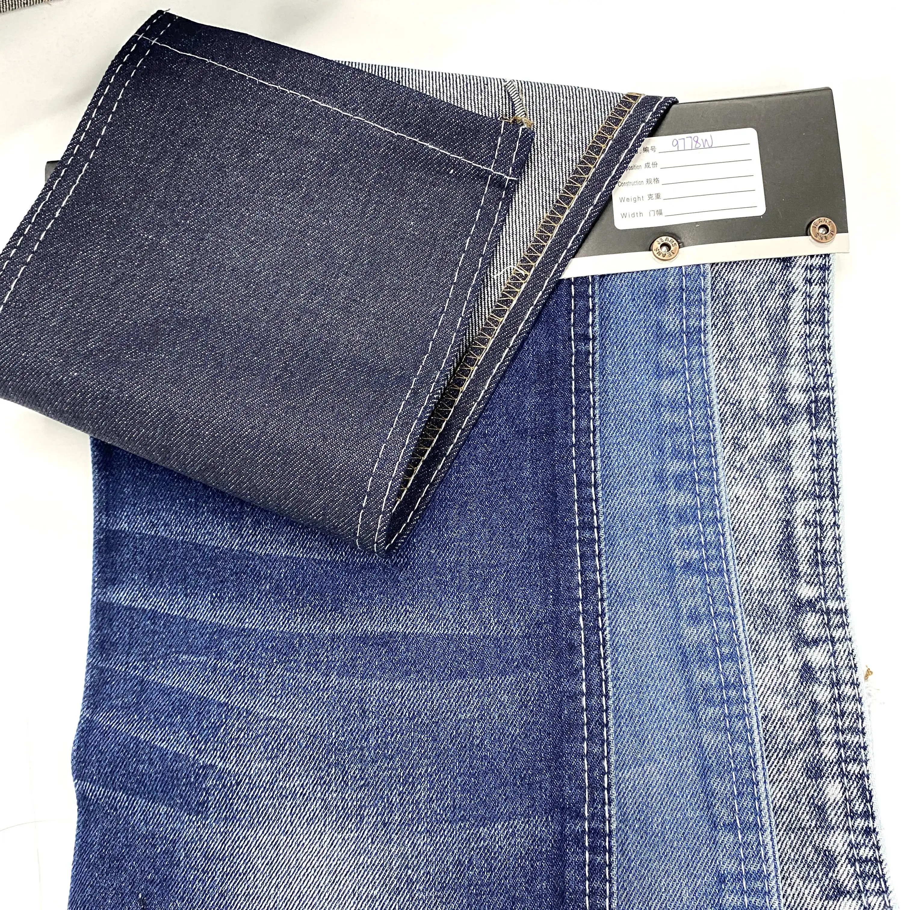 A buon mercato rotoli professionale Stock Jeans cotone Tc Denim tessuto per Jeans da uomo/Denim