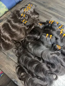 Vente en gros Paquets de cheveux indiens bruts alignés avec des cuticules vierges Extensions de cheveux humains bon marché à double tirage dans un style naturel ondulé - Product Image 2