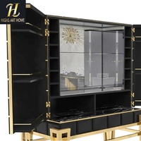 Meuble à vin autoportant de luxe moderne noir brillant avec cadre métallique doré pour cave à vin