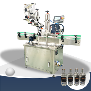 Étiqueteuse automatique de bouteilles pour timbre fiscal ou applicateur d'étiquettes autocollantes anti-voleur - Product Image 1