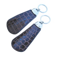 Porte-clés en métal de luxe avec chausse-pied et logo personnalisé Vente en gros de cadeaux personnalisés divers porte-clés en cuir