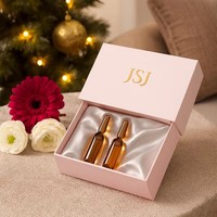 Boîte à tiroirs pour soins de la peau en noir mat de luxe avec pochette en velours pour sérum haut de gamme et coffret cadeau cosmétique de boutique