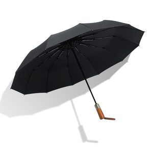 Paraguas plegable de tres pliegues con varillas de aleación de nailon, mango de madera, apertura automática, resistente a los rayos UV, diseño minimalista para viajes, uso en días soleados y lluviosos. - Product Image 5