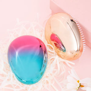 2024 nuova spazzola per parrucchieri a forma di uovo pettine per massaggio elettroplacca colorato uovo stellato per il lavaggio del pettine per capelli da donna - Product Image 1