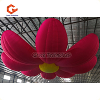 Décoration de fleur gonflable vibrante forme personnalisée fleur gonflable fleur accessoire de scène suspendu fleur sauter