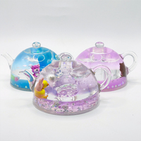 Service OEM personnalisé : Figurine théière en acrylique transparente à liquide flottant et à mouvement, avec paillettes