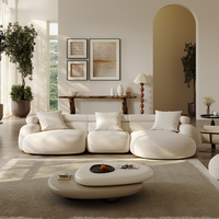 Canapé une place en tissu crémeux de style français, design tendance et breveté, avec structure en bois – Minimaliste moderne haut de gamme avec détails de sangles
