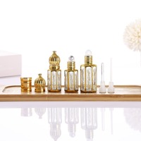 Vente en gros de flacons de parfum à l'huile d'attar arabe fantaisie dorée octogonale fine de 3 ml, 6 ml, 12 ml avec bille roulante et bâtonnet