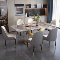 Ensemble table à manger moderne de luxe en acier au carbone, dessus en pierre de marbre, meubles de luxe stables pour villa, maison, appartement, hôtel et restaurant