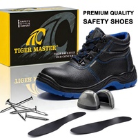 Bottes de sécurité pour chantier Tiger Master pour hommes, embout en acier EU, anti-perforation, doublure en maille bleue, cuir noir, antidérapant