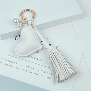 พวงกุญแจหนังรูปหัวใจแบบขายส่ง พร้อมพู่ห้อย PU  แบบกำหนดเองได้  อุปกรณ์ตกแต่งพวงกุญแจแฟชั่น - Product Image 6