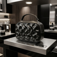 Sac bandoulière matelassé en PU noir de luxe 3D effet popcorn avec fermeture éclair, personnalisable avec logo, portable, multifonctionnel, pochette cadeau pour produits de soin