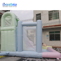 Maison de rebond en PVC de couleur pastel toboggan gonflable piscine enfants fête en plein air château plein d'entrain avec fosse à balles et toboggan à vendre