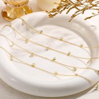 Chaîne de ventre à la mode pour femmes et filles, bijoux en cristal sexy pour le corps, chaîne de taille avec pompon en strass