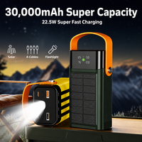 Batterie externe solaire 30000mAh 22.5W à charge rapide avec câbles 4-en-1 intégrés et lampe torche LED pour le camping et les voyages