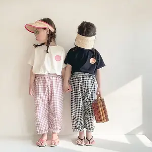 Baby smiling face T-shirt + plaid pants set 2022 summer children's clothing middle and small children's short sleeve 2-piece set
