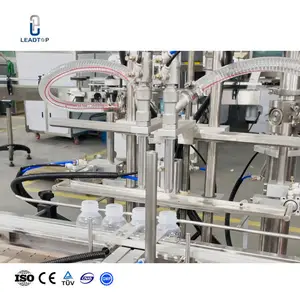 Ligne de machine d'étiquetage de capsulage remplissante de pot de liquide de solution de miel de mini piston automatique de 1000bph deux 2 têtes