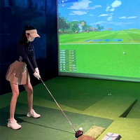 Véritable simulateur de golf Trackman interactif avec projection intelligente Nouveau design de boîtier de golf intérieur pour centre commercial