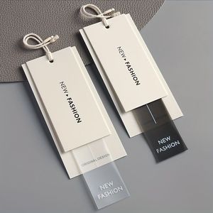 Etiquetas de ropa de papel con logotipo de lujo personalizado, estampado en caliente, tarjeta de visita, etiqueta de precio en relieve, etiqueta colgante con cuerda para ropa - Product Image 1