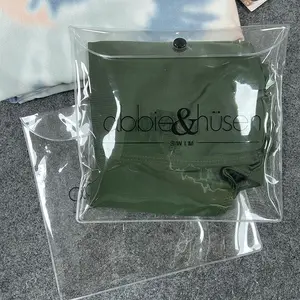 विशेष कस्टम लोगो स्पष्ट पीवीसी पैकेजिंग बैग, पीवीसी कपड़े बैग के साथ बटन