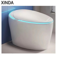 WC intelligent de luxe moderne en céramique monobloc allongé avec télécommande, fixation au sol, désodorisation automatique et double chasse d'eau