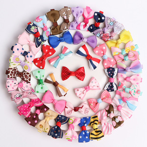 Venta al por mayor de 40 piezas de horquillas para el <span class=keywords><strong>cabello</strong></span> simples, dulces y pequeñas, con diseño floral, de tela, metal y perlas, para niñas, con lazo de cinta, rayas y puntos estampados - Product Image 2