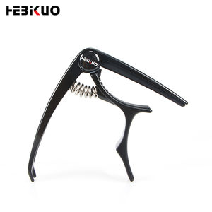 Capo BDJ-56 HEBIKUO para Guitarra, con Acabado Brillante Negro y Removedor de Clavijas Integrado para Guitarra Acústica/Eléctrica - Product Image 1