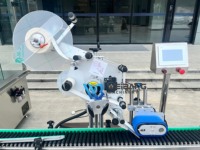 Machine d'étiquetage automatique horizontale pour bouteilles rondes, flacons de liquides oraux, ampoules, tubes de réactifs et rouges à lèvres