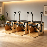 Chaise de Pilates en chêne avec pédale fendue, barres réglables et poignée en D, idéale pour studio de fitness de 100 m²