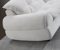 Canapé-lit Chesterfield moderne deux places en tissu, sans dossier, avec mousse réglable et accoudoirs carrés pour se détendre dans le salon