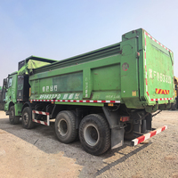 Б/у самосвал SINOTRUK HOWO 8X4 с левым рулем, дизельный, МКПП, двигатель Weichai, Евро-2, грузоподъемность 41-50 т