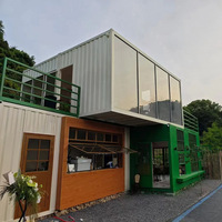 Magasin modulaire à double étage en acier préfabriqué, café-restaurant à montage rapide pour utilisation en centre commercial, résistant au feu, design moderne