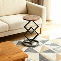 Table basse ronde en bois de noyer noir et résine époxy naturelle avec base géométrique en métal