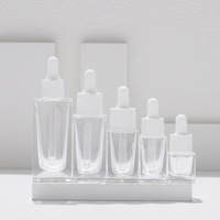 Bouteilles d'huile essentielle de forme carrée transparente 5ml 10ml 15ml 30ml 50ml compte-gouttes en verre liquide Essence pour les sérums de soins de la peau en vente