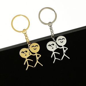Divertido y parodista colgante para bolso de personaje de dibujos animados, llavero de acero inoxidable al por mayor con diseño de pareja de caras que se pellizcan y mecha de cerillas - Product Image 1