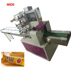 Machine d'emballage automatique à oreiller horizontal pour barres énergétiques de type arachide et bonbons cassants