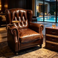 Fauteuil Chesterfield vintage à dossier haut, fauteuil pour cigares Godfather avec plateau à cigares, canapé en cuir véritable, salon d'hôtel, salle VIP d'aéroport