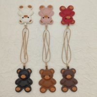 Nouvel accessoire de porte-clés mousqueton de style lanière en cuir PU à la mode pour pendentif clé de voiture