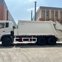 Camion à ordures compacteur Dongfeng Tianlong 6x4 d'occasion, chargement arrière, 25 tonnes, pour grandes villes