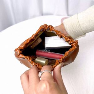 Nouvelle Pochette de Rangement pour Clés Mini Étanche et Élégante 2026, Personnalisée en PU Grande Capacité, Étui à Fermeture Éclair avec Logo Bronze Doré Effet Shrapnel - Product Image 6