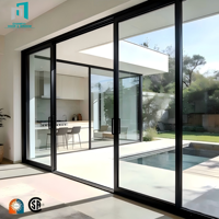 Porte coulissante intérieure en aluminium avec option verre dépoli pour la séparation des espaces humides de la salle de bain et de la buanderie
